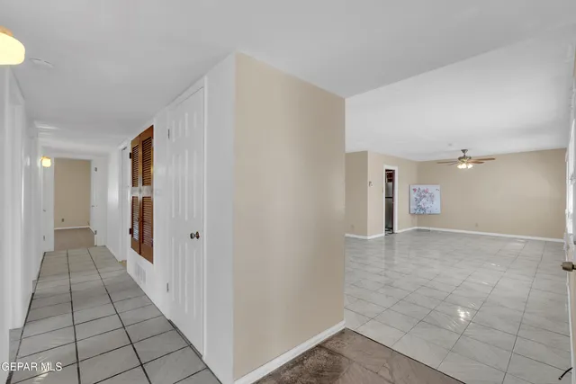 a view of a room with wooden floor and roof top