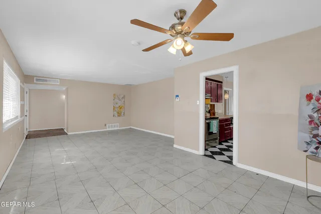 a kitchen with stainless steel appliances granite countertop a refrigerator sink and cabinets