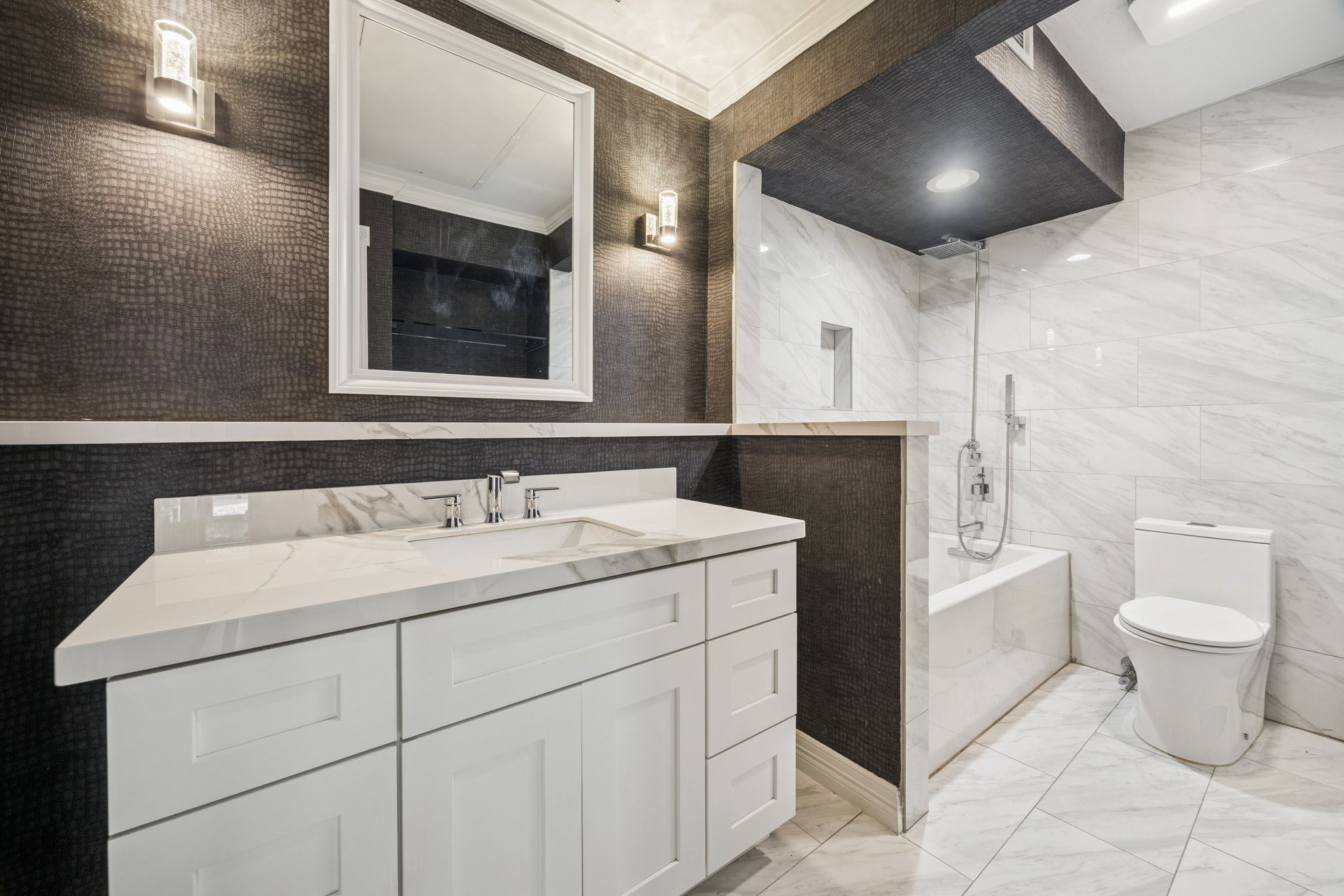 5200 Weslayan Street, Unit 101 Houston, TX 77005 - Photo 11 of 19 Gorgeous updated bathroom with rain shower, quartz counters and designer finishes.