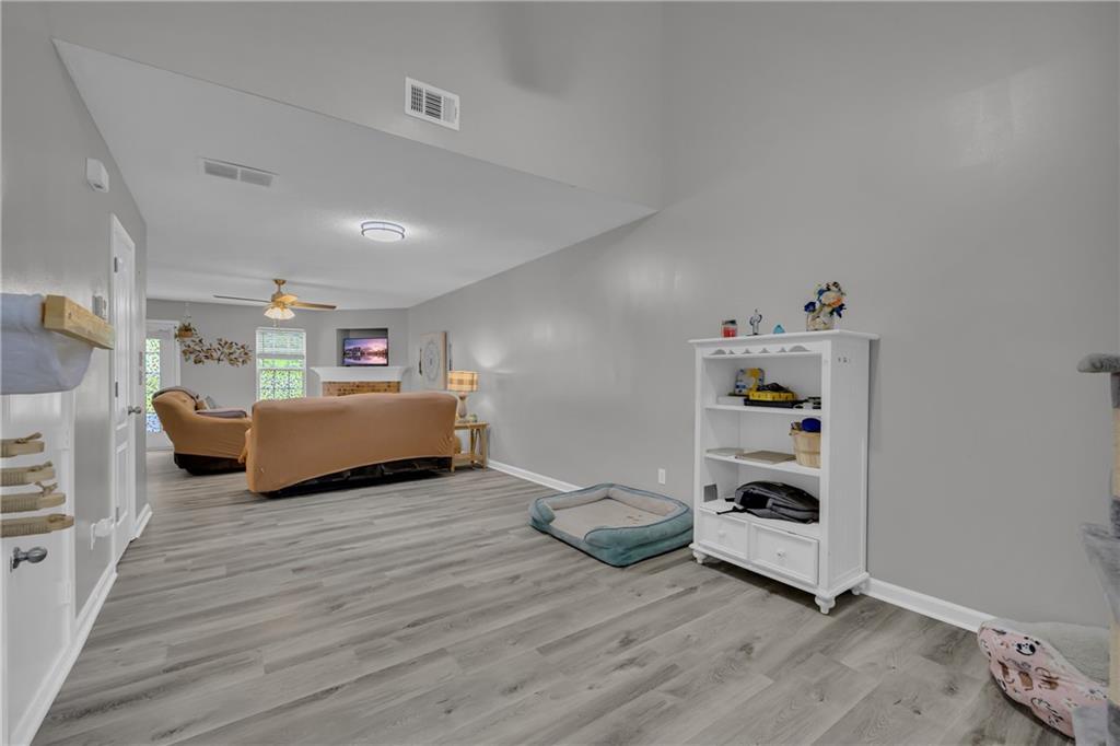 1498 Box Circle Winder, GA 30680 - Photo 14 of 56 a living room with furniture and a wooden floor