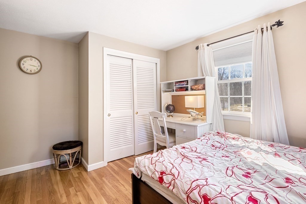 224 Oregon Road Ashland, MA 01721 - Photo 7 of 15 a bedroom with a bed and a window