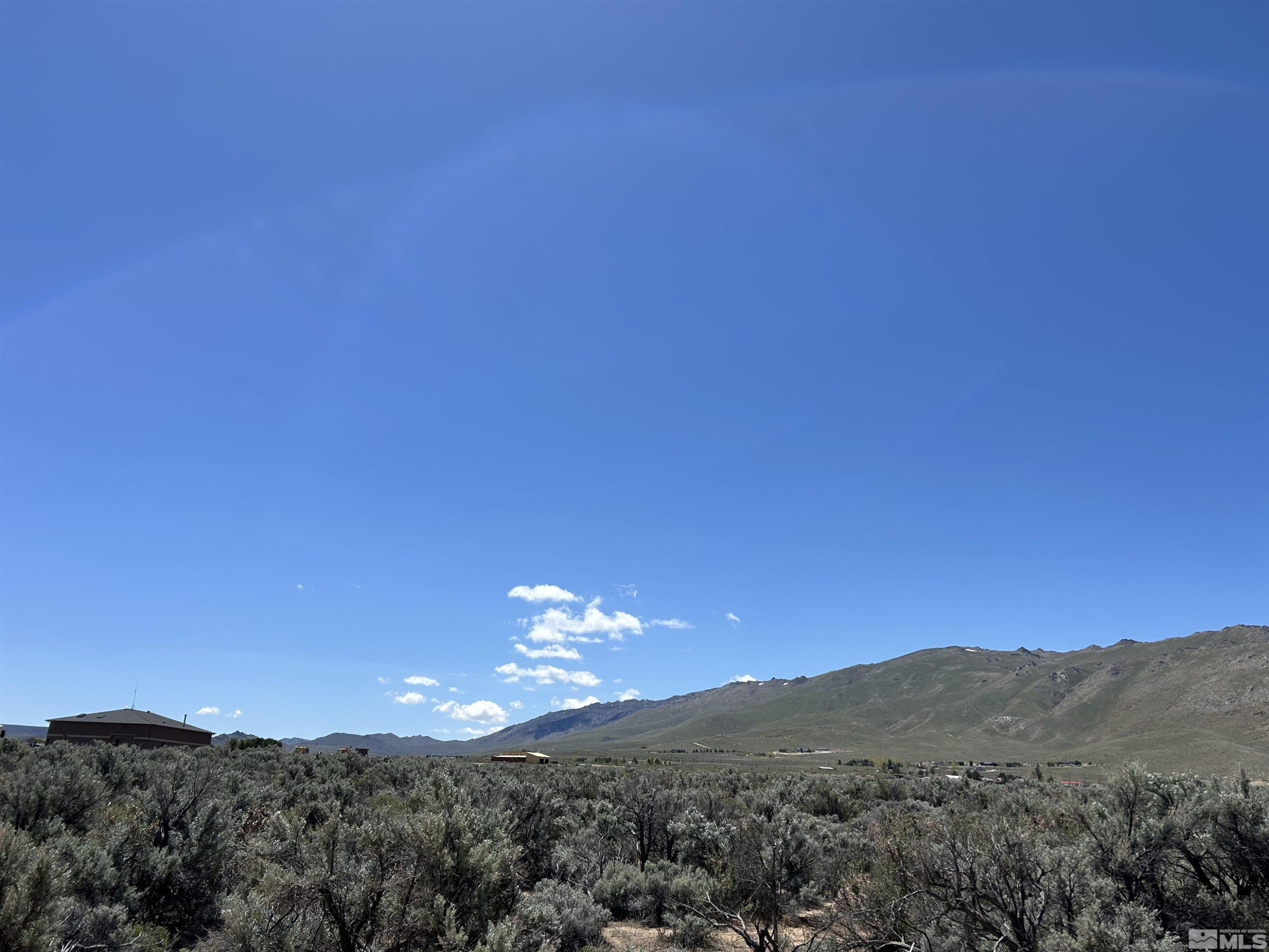22905 Fetlock Drive Reno, NV 89508 - Photo 14 of 18 a view of a city with a mountain