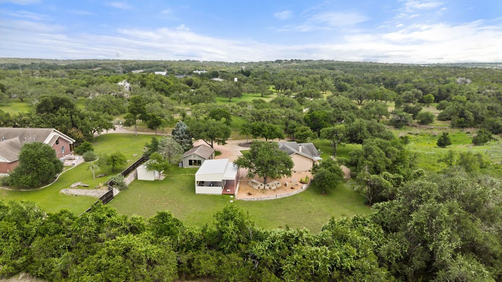 12135 Fitzhugh Road Austin, TX 78736 - Photo 4 of 30 an aerial view of residential houses with outdoor space and trees