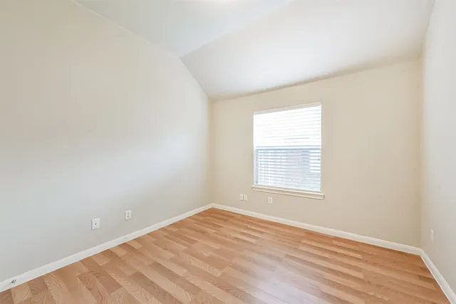 a bath tub sitting next to a bathroom sink