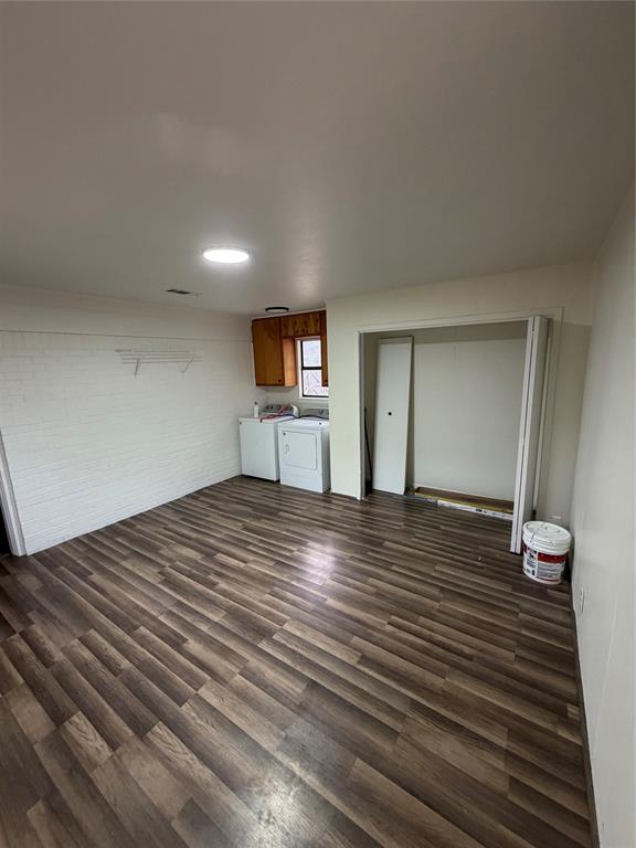 400 South Vick Street Decatur, TX 76234 - Photo 7 of 22 a view of empty room with wooden floor