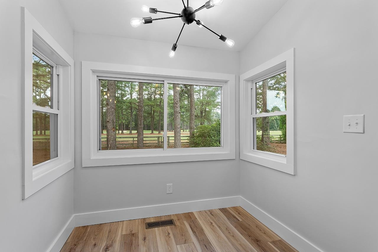 3420 East Garner Road Clayton, NC 27520 - Photo 13 of 30 a view of an empty room with a window