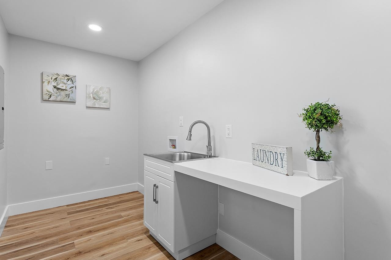 3420 East Garner Road Clayton, NC 27520 - Photo 17 of 30 a close view of sink and tap