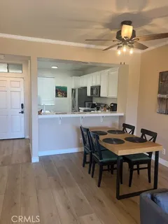 a kitchen with a table and chairs in it