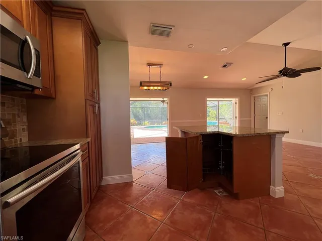 a view of a electric appliances in a kitchen
