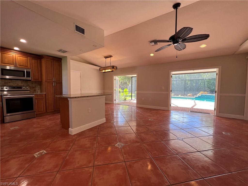 4724 32nd Avenue Southwest Naples, FL 34116 - Photo 21 of 39 a view of a electric appliances in a kitchen