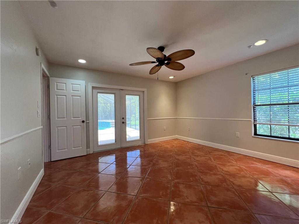 4724 32nd Avenue Southwest Naples, FL 34116 - Photo 26 of 39 a view of an empty room with a window
