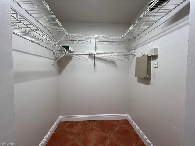 a bathroom with a sink toilet a mirror and shower