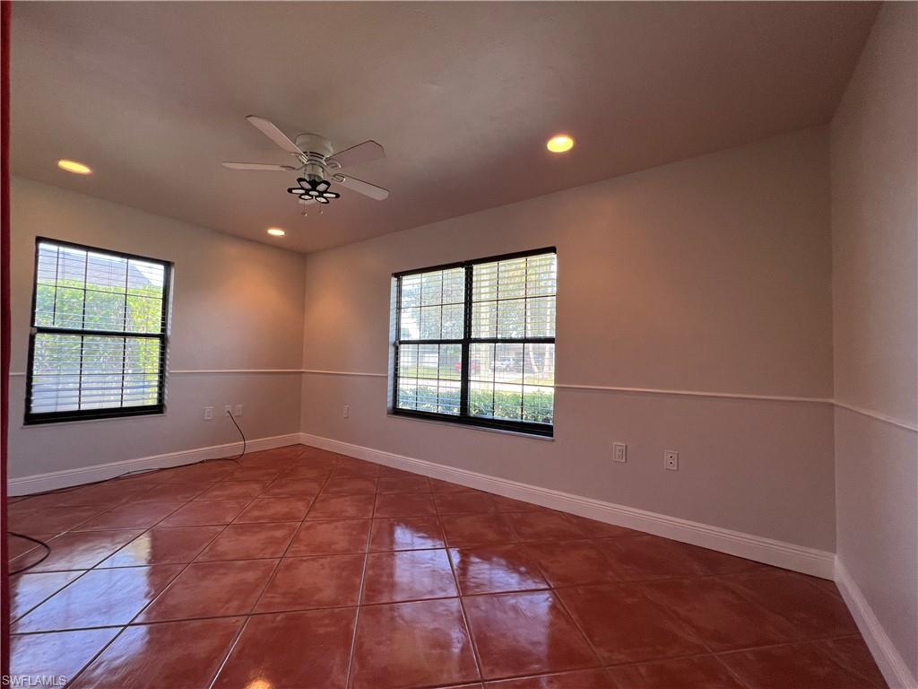 4724 32nd Avenue Southwest Naples, FL 34116 - Photo 29 of 39 a view of an empty room with a window