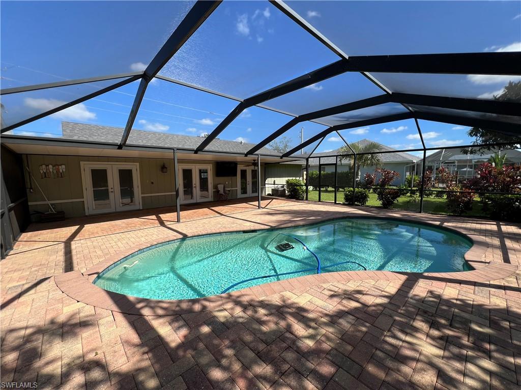 4724 32nd Avenue Southwest Naples, FL 34116 - Photo 5 of 39 a view of a swimming pool with a patio