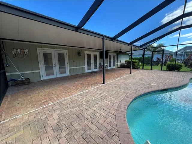 a view of a backyard of a house