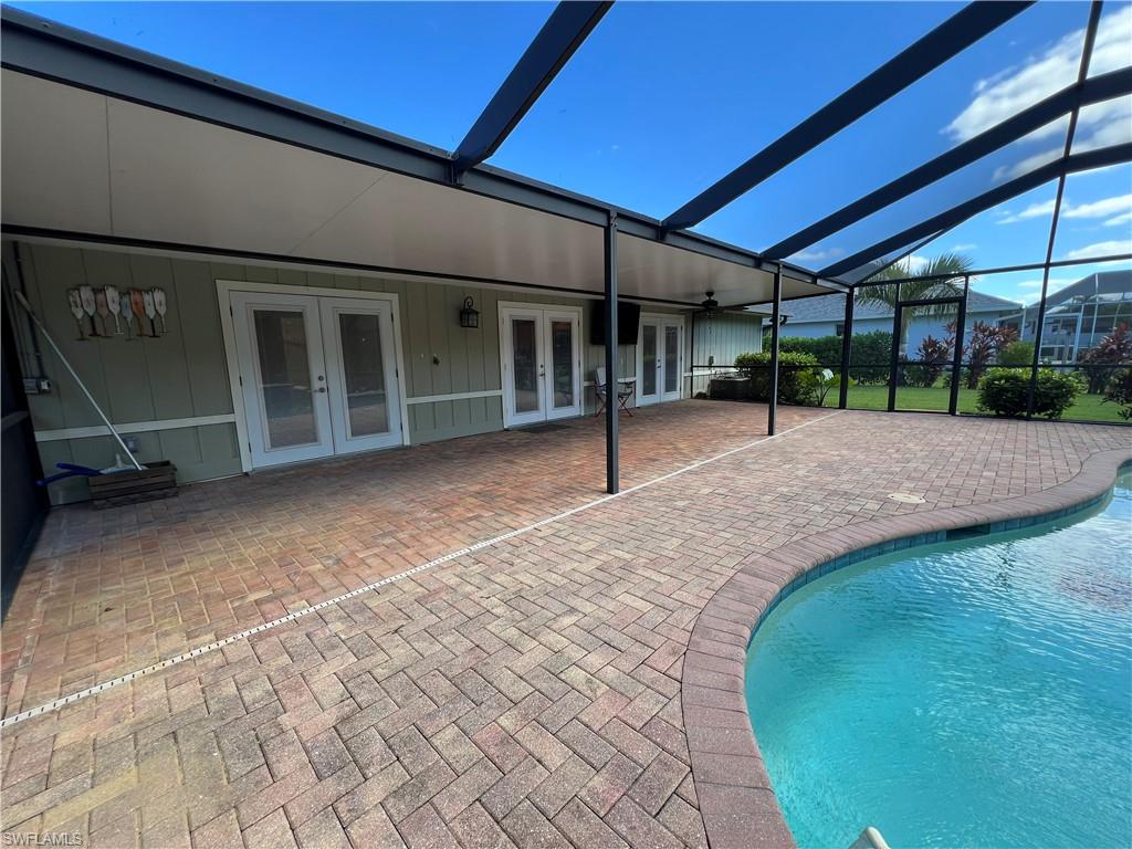 4724 32nd Avenue Southwest Naples, FL 34116 - Photo 7 of 39 a view of a backyard of a house