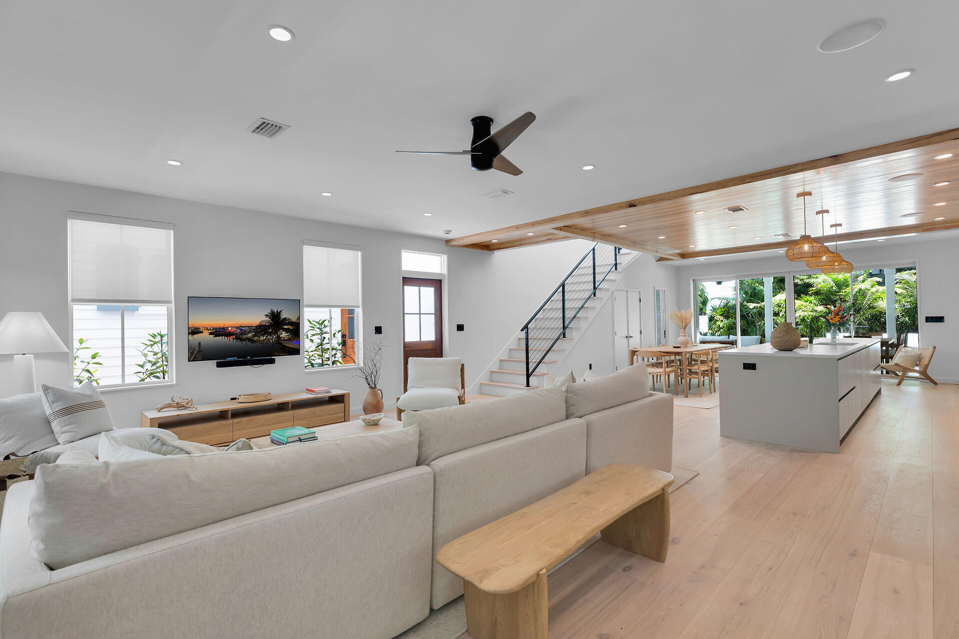 317 Whitehead Street Key West, FL 33040 - Photo 15 of 78 a living room with furniture and a flat screen tv