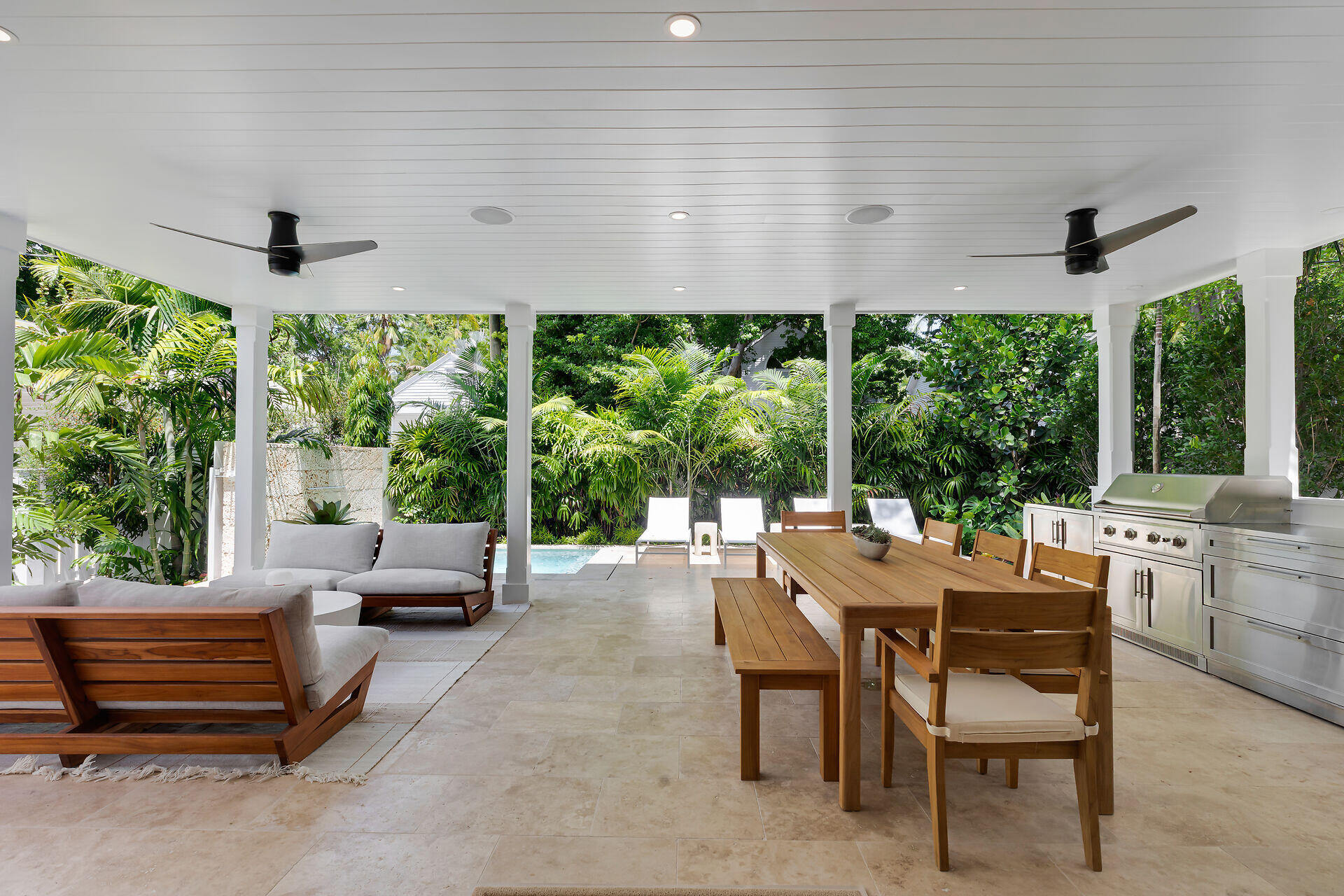 317 Whitehead Street Key West, FL 33040 - Photo 24 of 78 a outdoor space with a large window and furniture