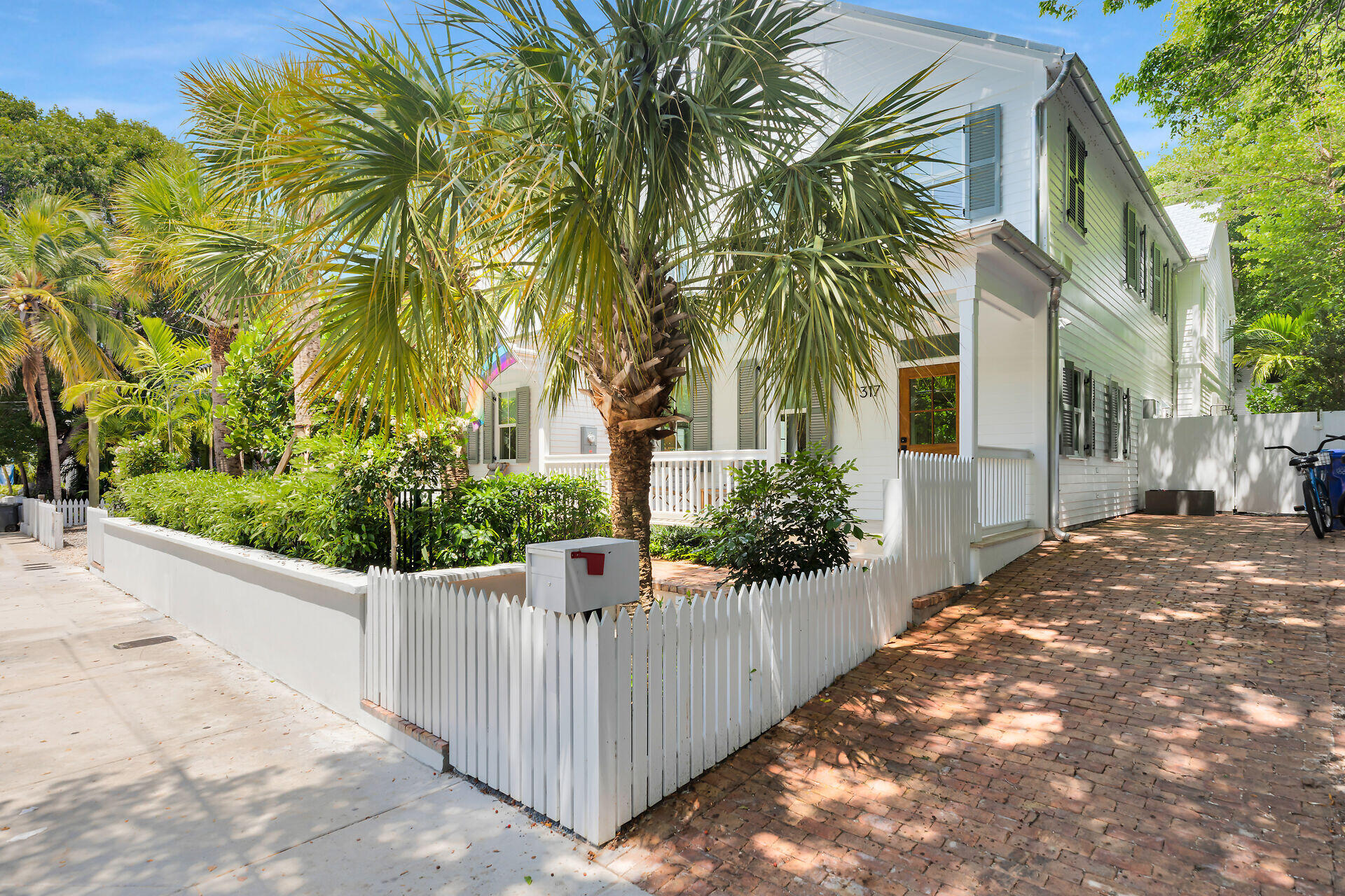 317 Whitehead Street Key West, FL 33040 - Photo 3 of 78 a view of a house with a yard and plant