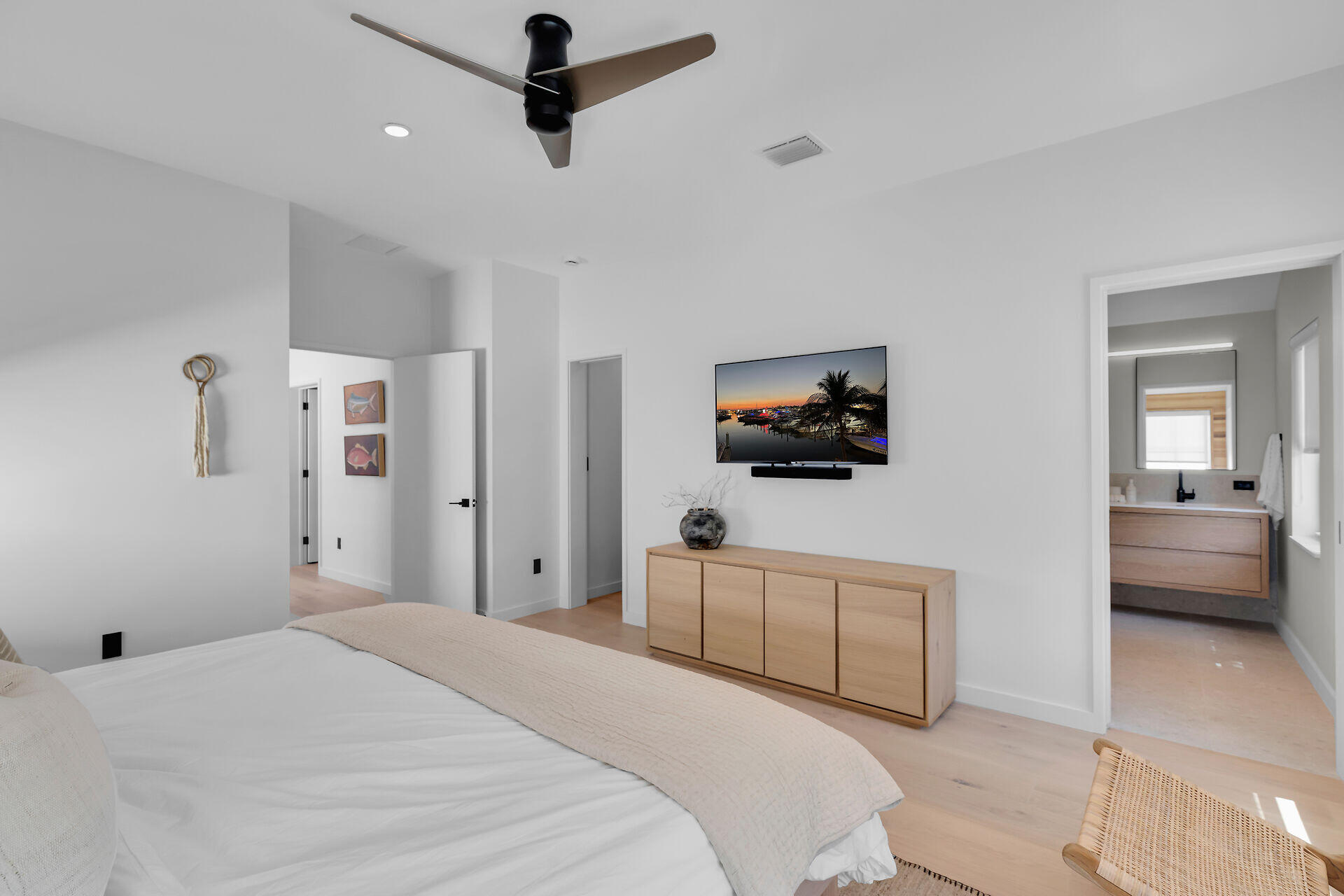 317 Whitehead Street Key West, FL 33040 - Photo 46 of 78 a bedroom with a bed and a flat screen tv