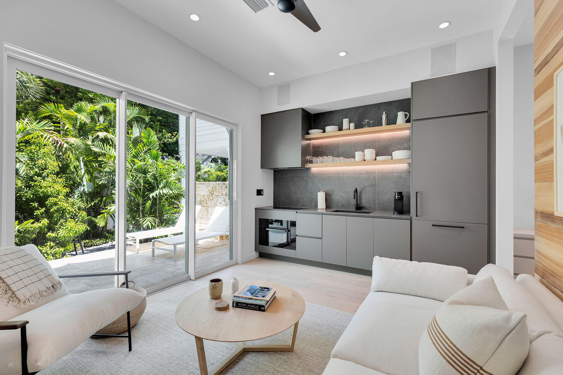 317 Whitehead Street Key West, FL 33040 - Photo 65 of 78 a living room with furniture and a large window