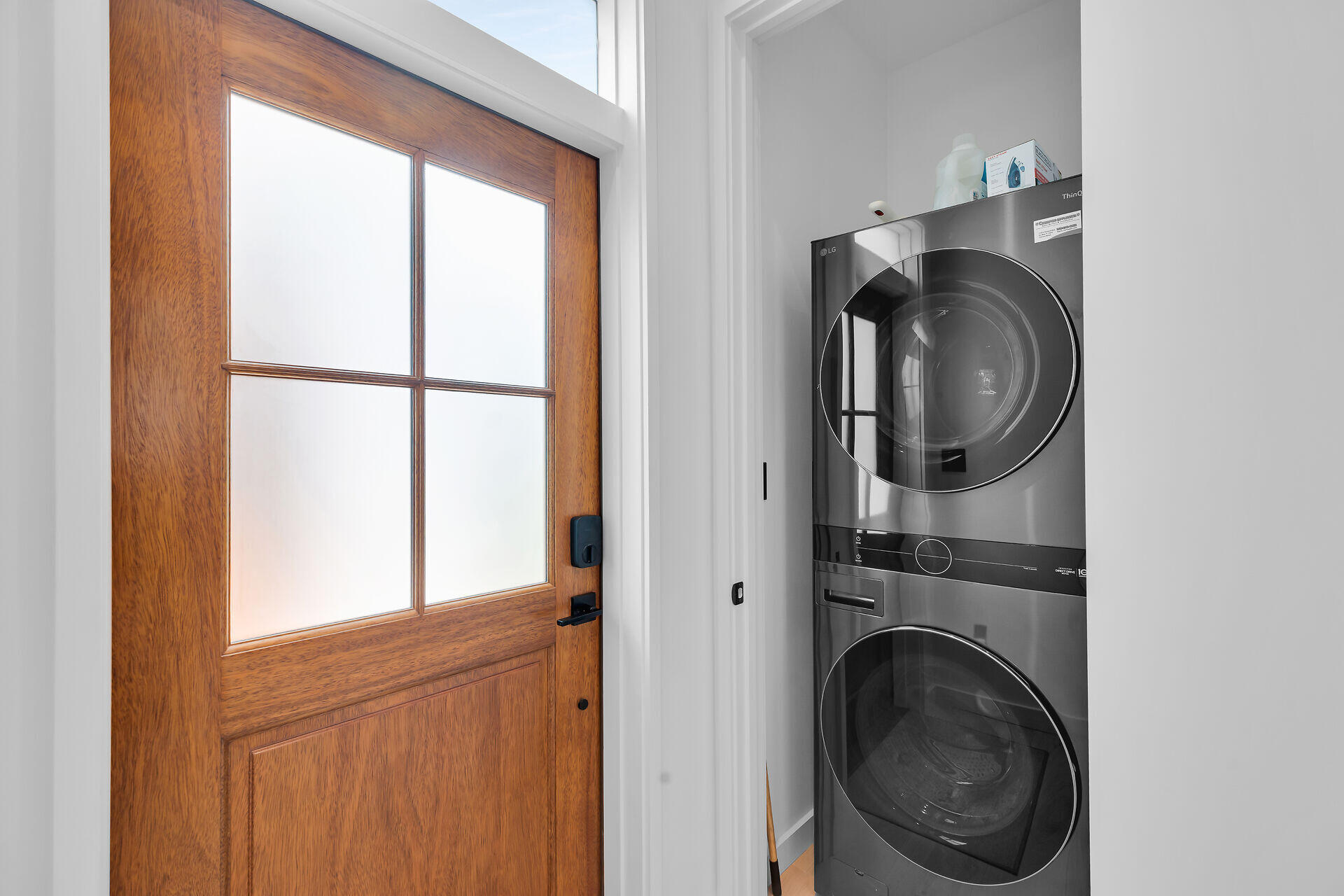 317 Whitehead Street Key West, FL 33040 - Photo 75 of 78 a view of a hallway with washer and dryer