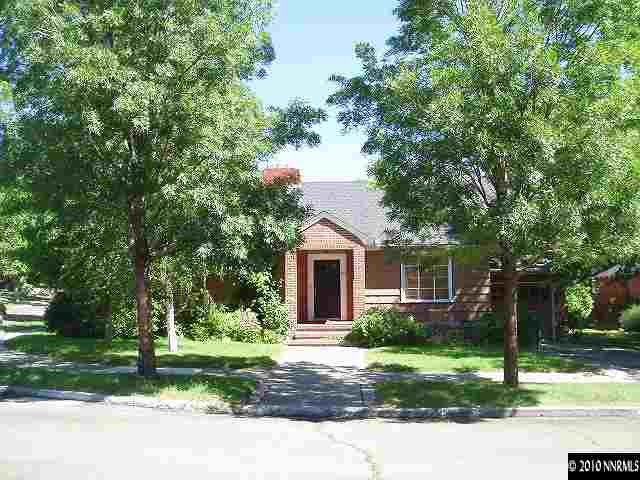 675 Manor Drive Reno, NV 89509 - Photo 9 of 9 a front view of a house with a yard and potted plants