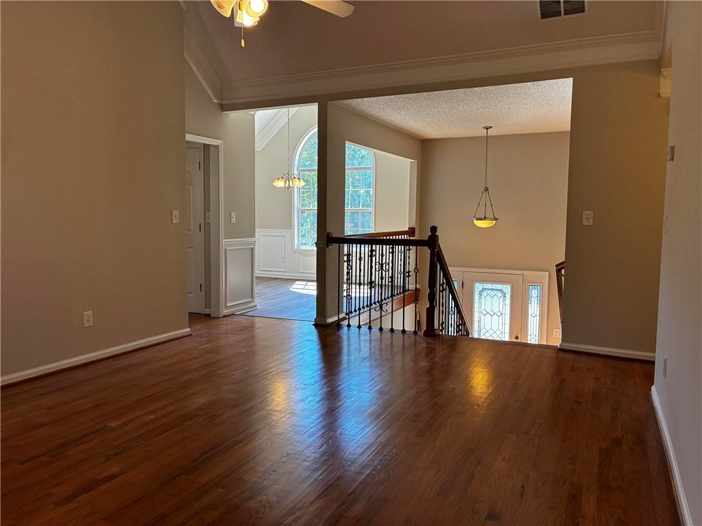 337 Madison Avenue Hampton, GA 30228 - Photo 6 of 32 a view of empty room with wooden floor