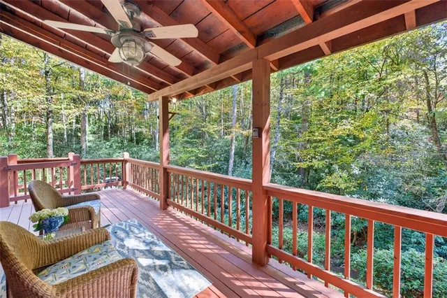 a view of a two chairs in the deck