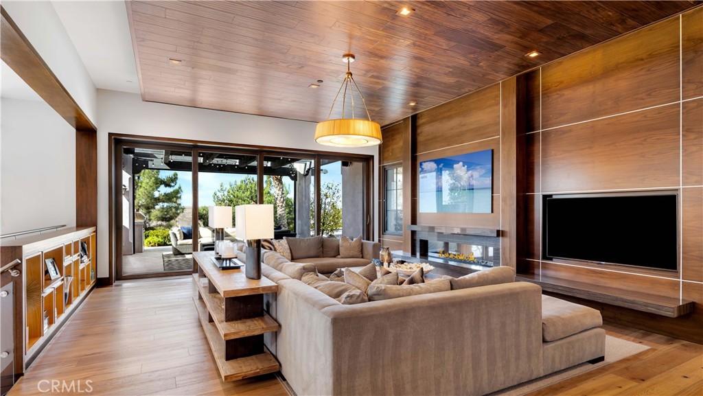 2 Thomas Road Ladera Ranch, CA 92694 - Photo 10 of 69 Notice the warmth of aged Mediterranean wire-brushed wood floors set against soft neutral tones throughout the home.