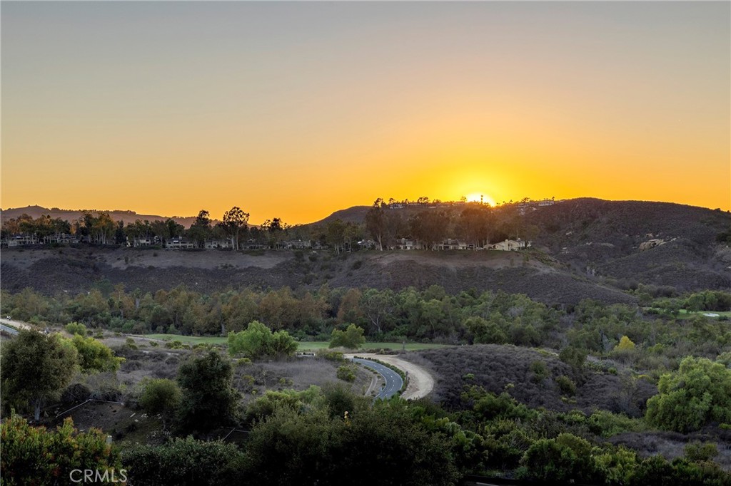 47 Vernal Irvine, CA 92603 - Photo 2 of 38 a view of lake with mountain and trees