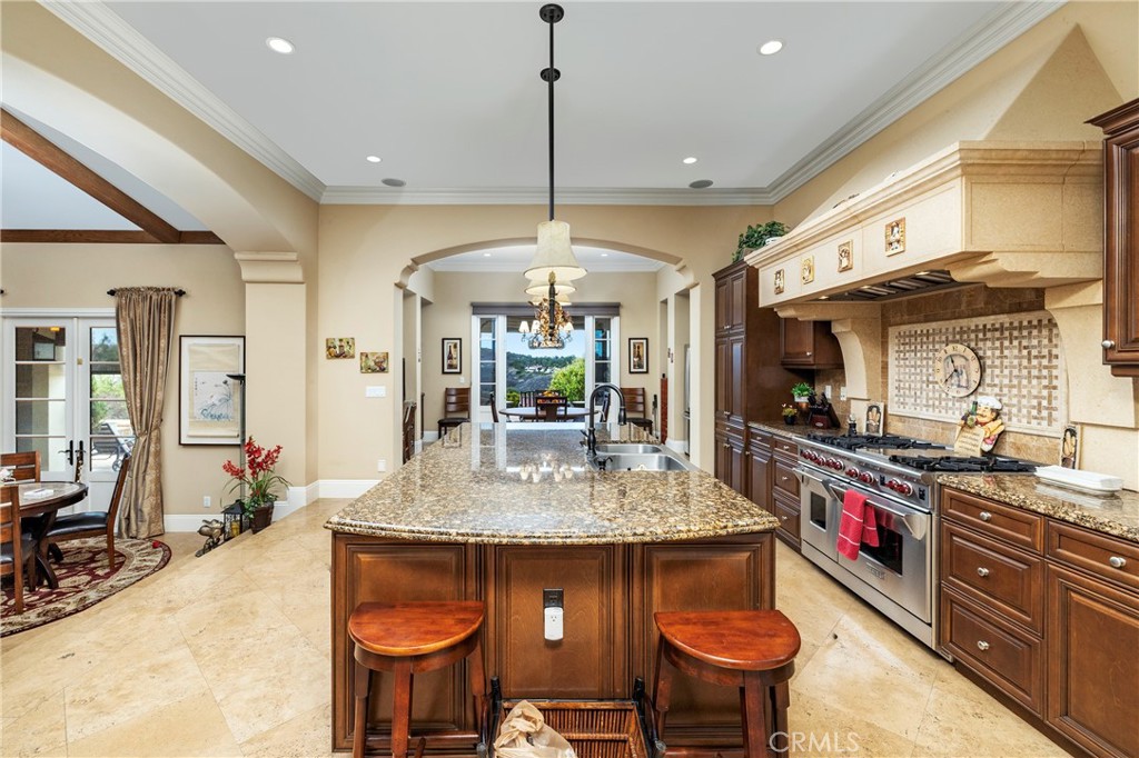 47 Vernal Irvine, CA 92603 - Photo 20 of 38 a kitchen with stainless steel appliances granite countertop a stove a sink and a refrigerator