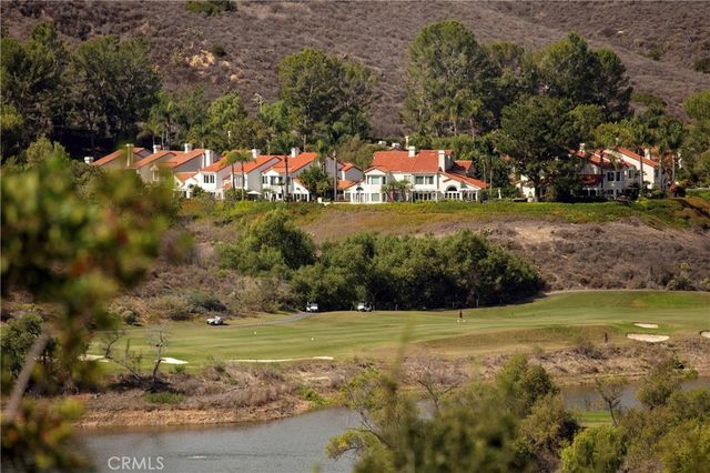a view of a house with a big yard
