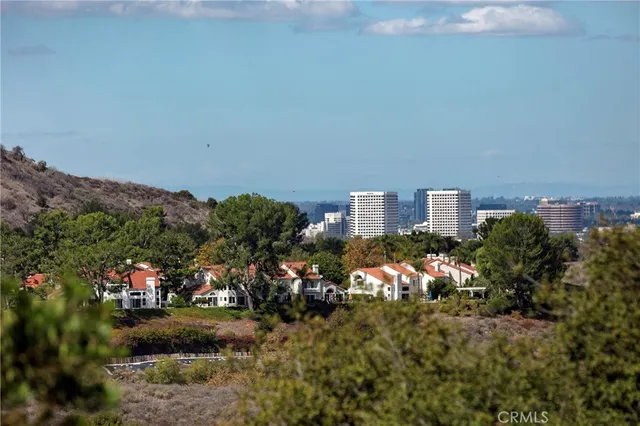 a view of a street with a building in the background