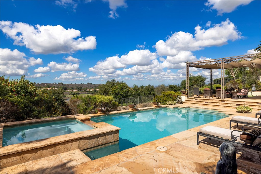 47 Vernal Irvine, CA 92603 - Photo 9 of 38 a view of a lake with couches chairs
