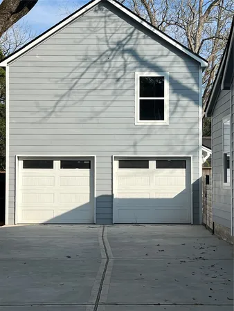 a house view with a garden space