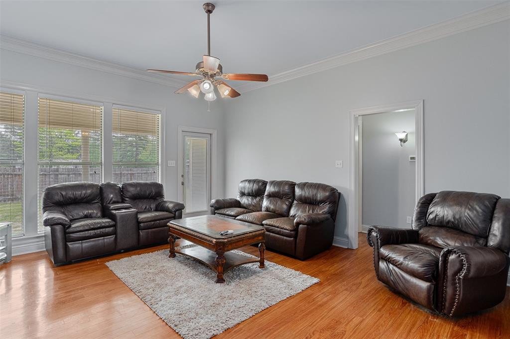 102 Fitzwilliam Street Haughton, LA 71037 - Photo 5 of 18 a living room with furniture a bed and a chandelier