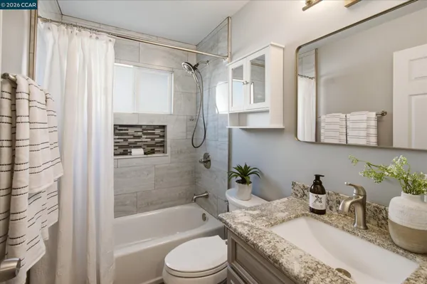 a view of a hallway with washer and dryer