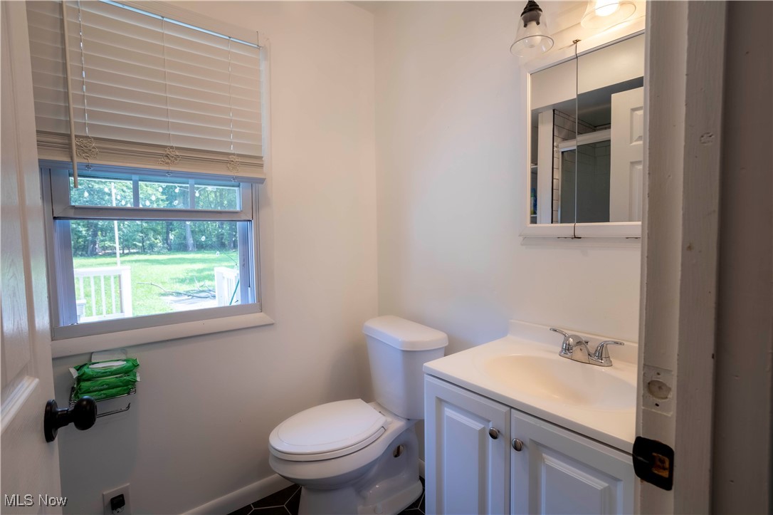 2247 Walter Road Westlake, OH 44145 - Photo 13 of 22 Bathroom featuring vanity and toilet