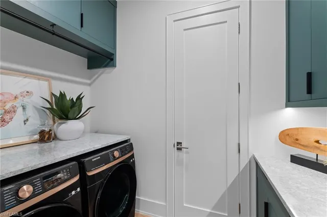 a view of kitchen with sink and wooden floor