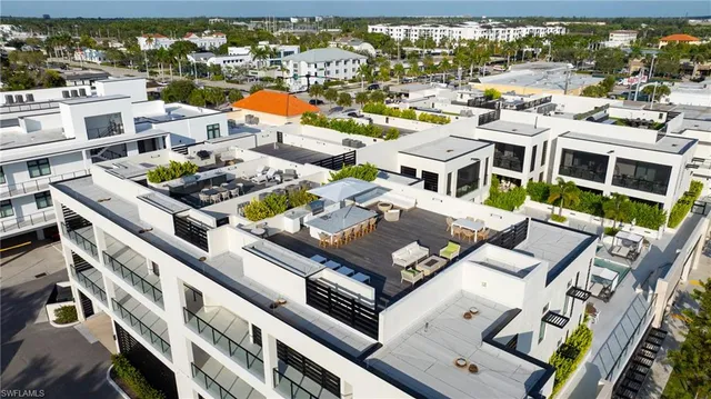 an aerial view of city with balcony