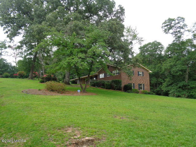 5539 Bankston Lake Road Macon, GA 31216 - Photo 2 of 29 a view of a house with a yard