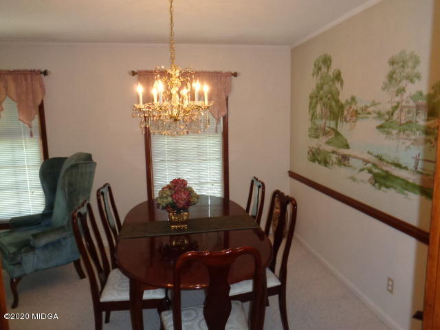 5539 Bankston Lake Road Macon, GA 31216 - Photo 15 of 29 a dining room with furniture and window