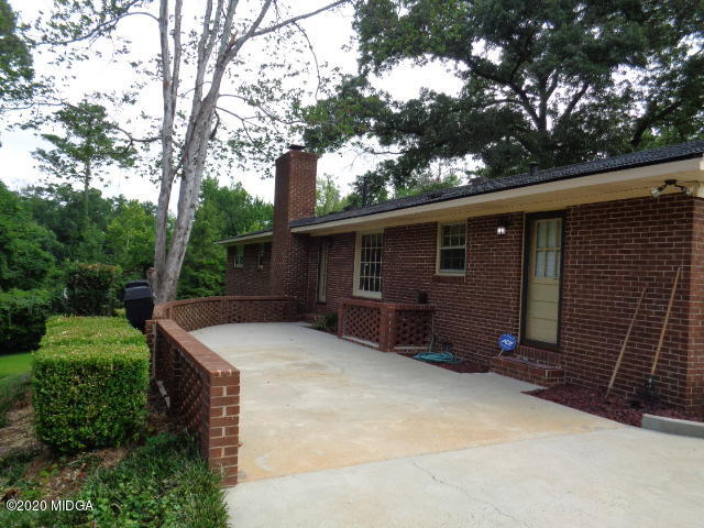 5539 Bankston Lake Road Macon, GA 31216 - Photo 5 of 29 front view of a house with a yard