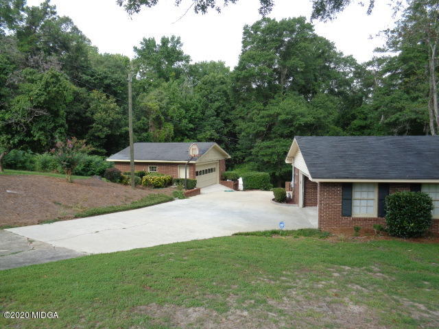 5539 Bankston Lake Road Macon, GA 31216 - Photo 7 of 29 a house view with a garden space