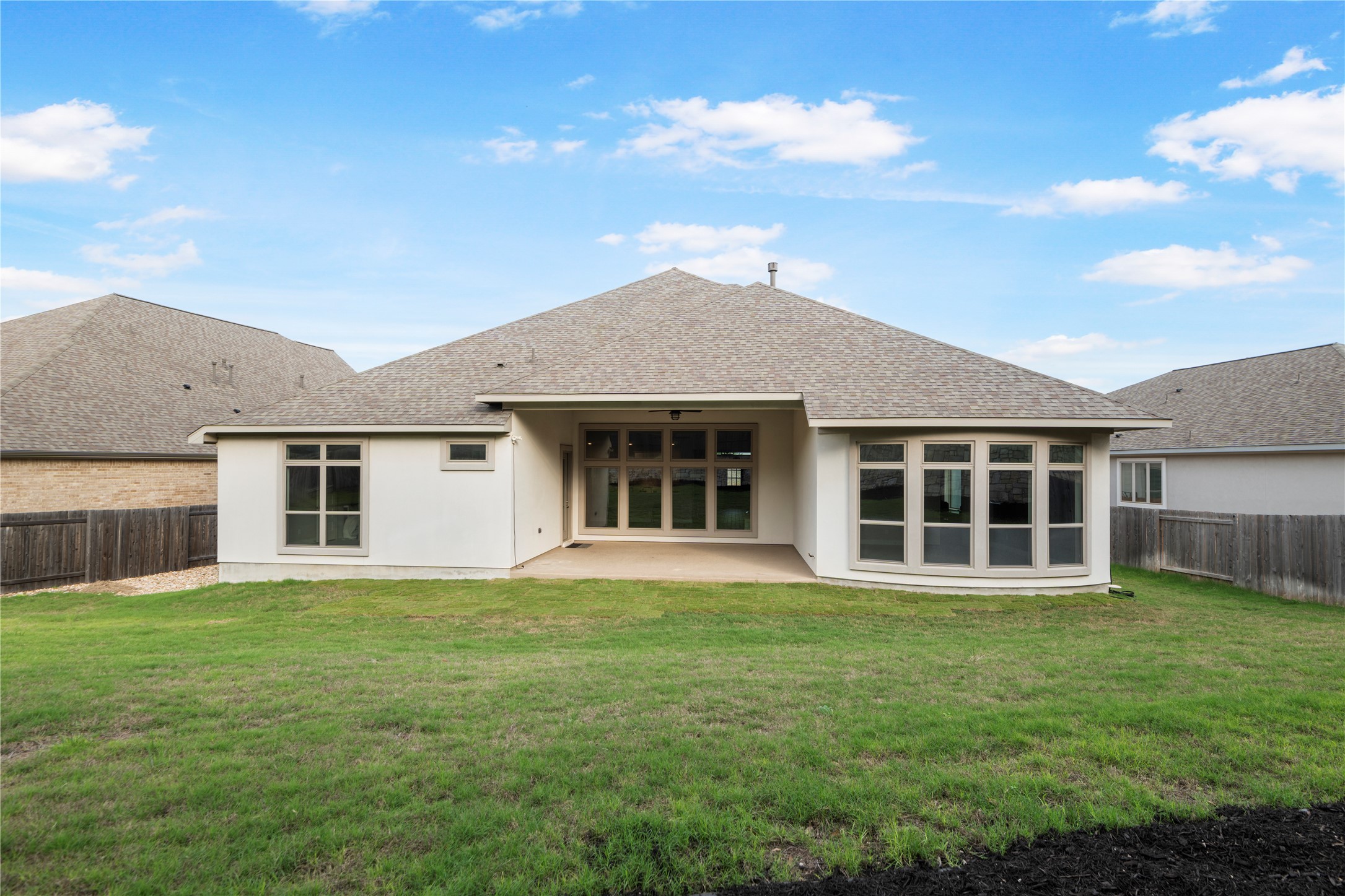 104 Catani Loop Georgetown, TX 78628 - Photo 13 of 34 A private, fenced backyard offers ample space for outdoor living and recreation.