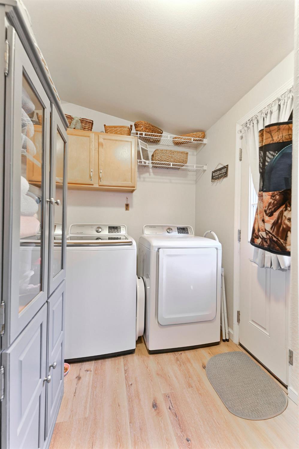 1400 West Marlette Street, Unit 2 Ione, CA 95640 - Photo 19 of 79 a utility room with cabinets washer and dryer