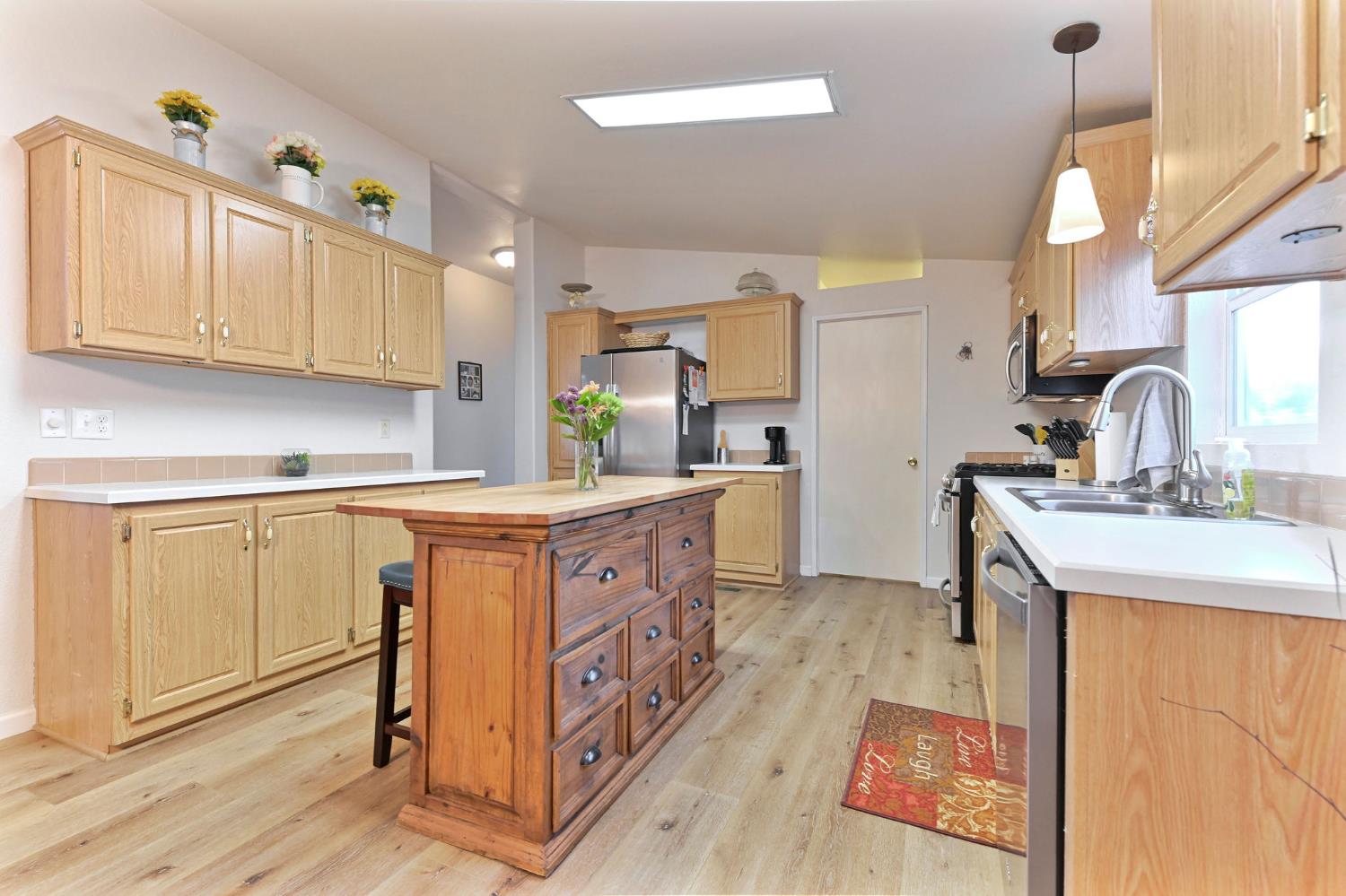1400 West Marlette Street, Unit 2 Ione, CA 95640 - Photo 20 of 79 a kitchen with stainless steel appliances granite countertop a sink stove and cabinets