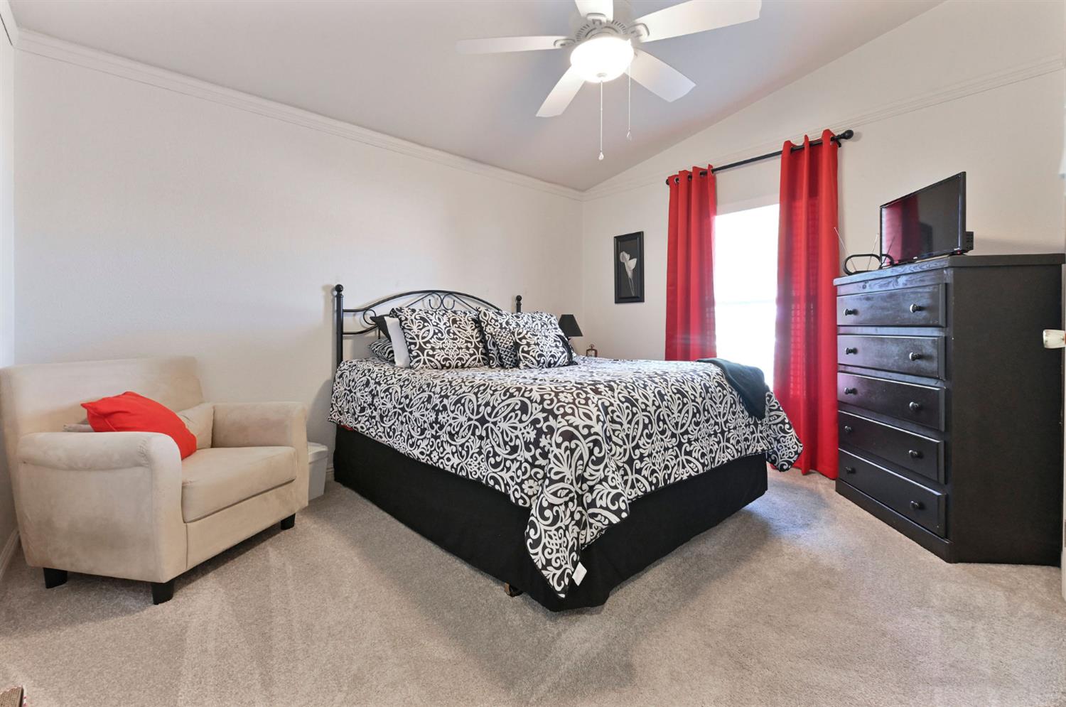 1400 West Marlette Street, Unit 2 Ione, CA 95640 - Photo 31 of 79 a bedroom with a bed couch and dresser