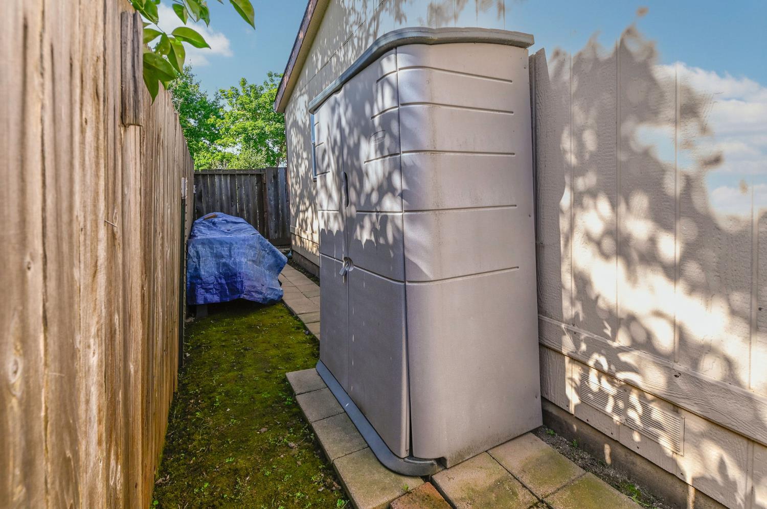 1400 West Marlette Street, Unit 2 Ione, CA 95640 - Photo 45 of 79 a backyard of a house with table and chairs